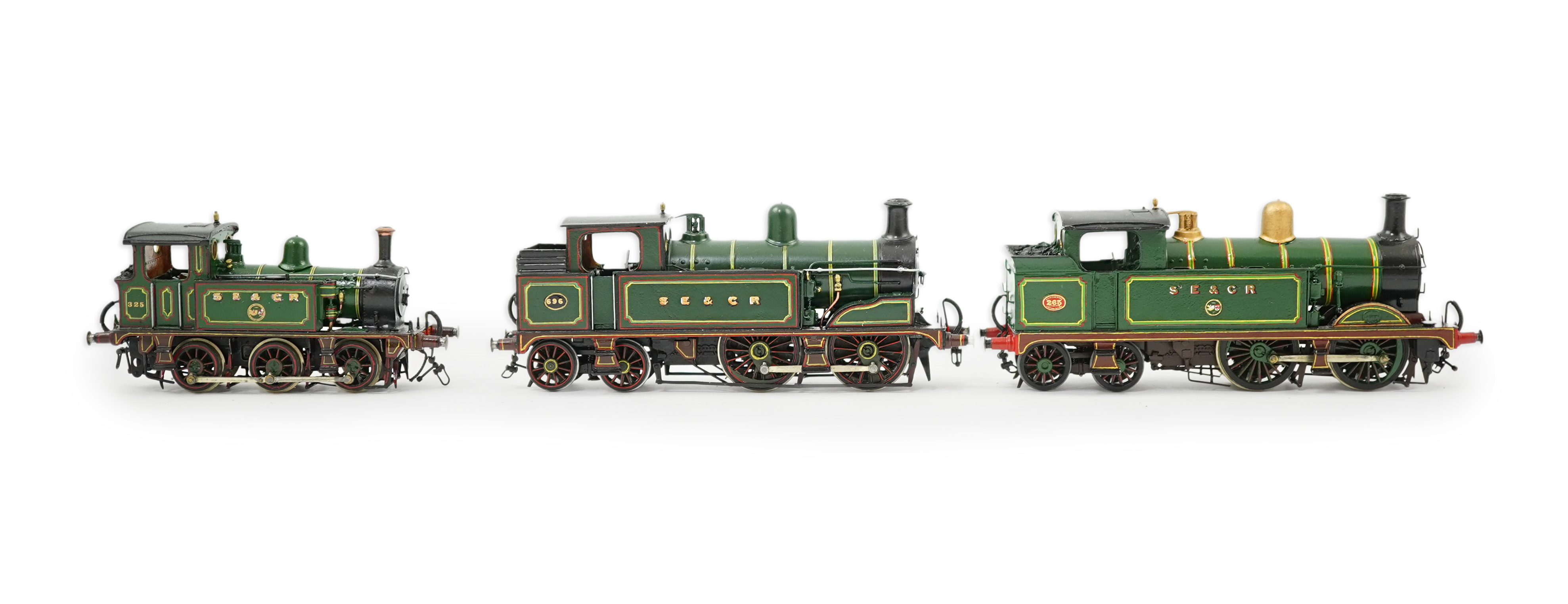 Three 00 gauge brass and white metal kit built Wainwright designed SE&CR tank locomotives (possibly by Wills Finecast); a class R1 0-4-4T, 696, a class H 0-4-4T, 263, and a class P 0-6-0T, 325, constructed, all painted a